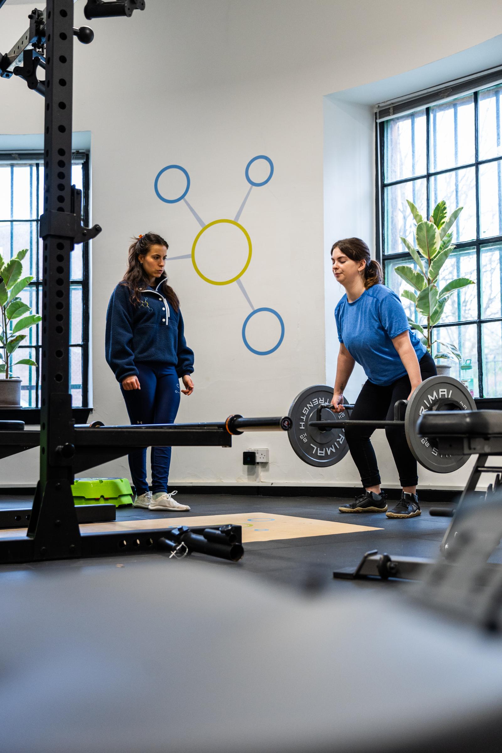 KA3_4429 Clinical movement analysis of a deadlift progression to ensure optimal spinal alignment during a personal training Edinburgh session.